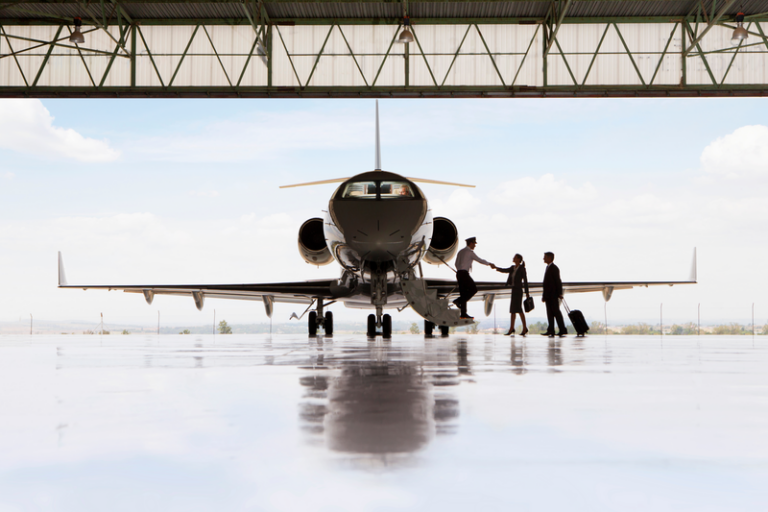 The front of an aircraft within a hanger